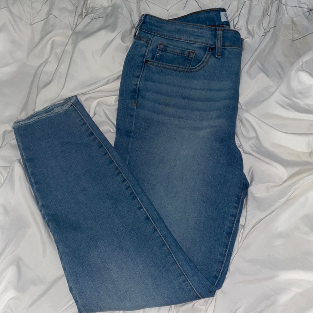 Blue jeans they are a little lose at the bottom but tight everywhere else.